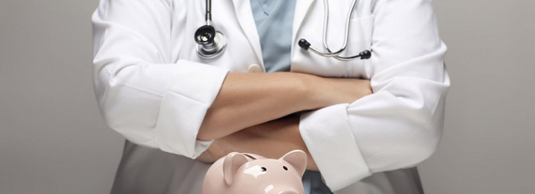 Оплата лечения ребенка сотрудника: НДФЛ и страховые взносы